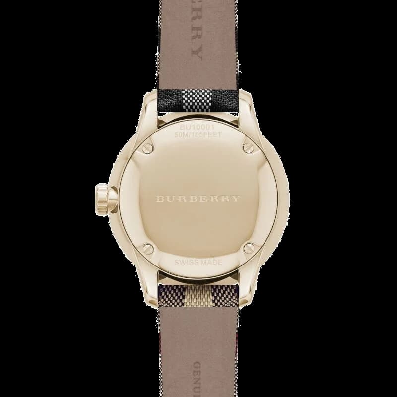 Gros plan sur le cadran or de la Burberry BU10001