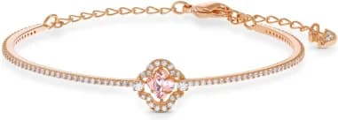 Swarovski 5516476 montre femme, au cadran scintillant et bracelet en métal doré