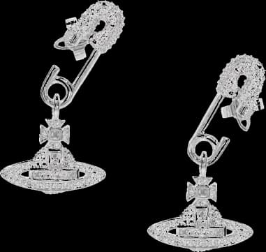 Vivienne Westwood safety pin earrings in silver metal and crystals