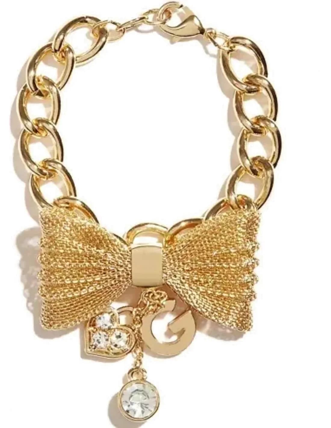 Bracelet Guess Doré Noeud papillon et breloques en métal jaune