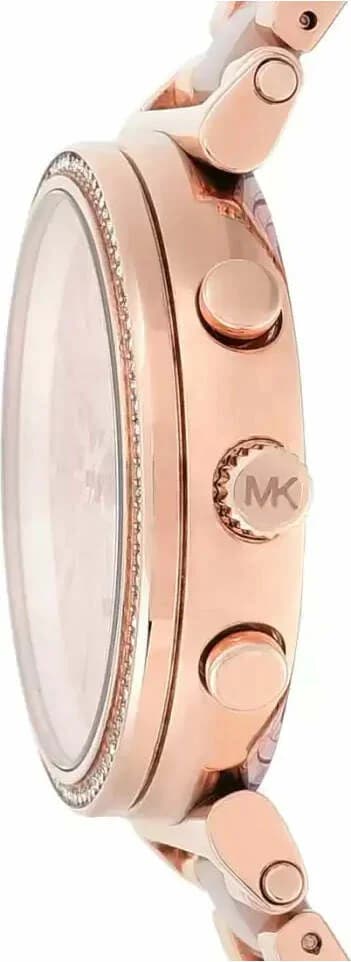 Gros plan sur le cadran or rose de la Michael Kors MK6560
